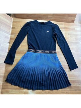 Nono long-sleeved dress with a dark blue top and pleated skirt size 9/10